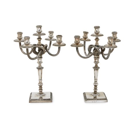 Coppia di candelabri in argento