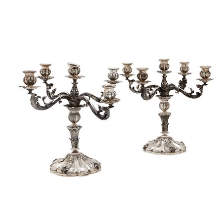 Coppia di candelabri in argento, Italia XX secolo