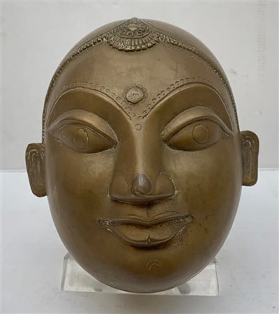 Manifattura del Sud-Est asiatico. "Testa di Buddha" scultura in metallo a guisa