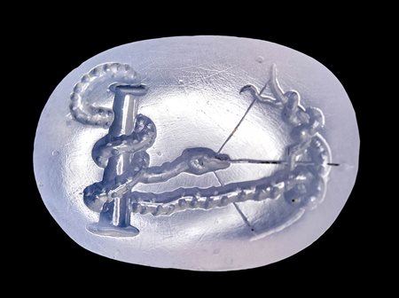 A large roman chalcedony intaglio. Snake with bow. 