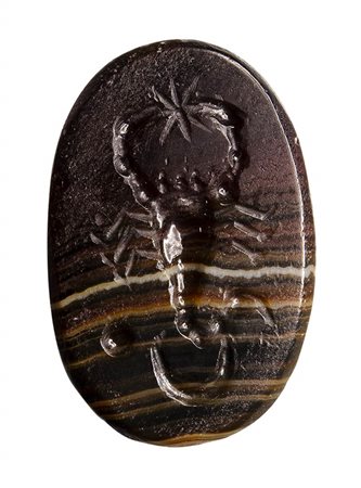 A roman astrological banded agate intaglio. Scorpio with moon and star. 