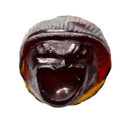 A roman garnet cameo. Comical theater mask. 
