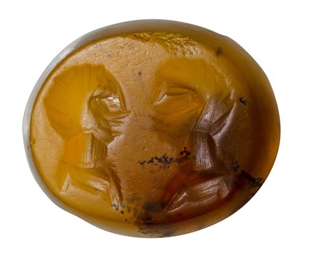 An eastern roman agate intaglio. Two male portraits. 