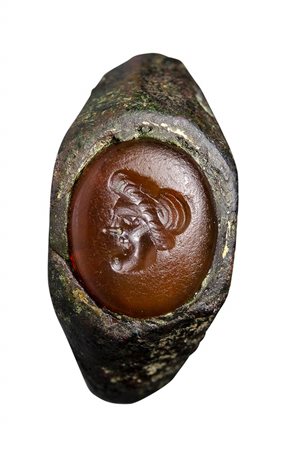 A roman bronze ring with carnelian intaglio. Theatrical mask. 