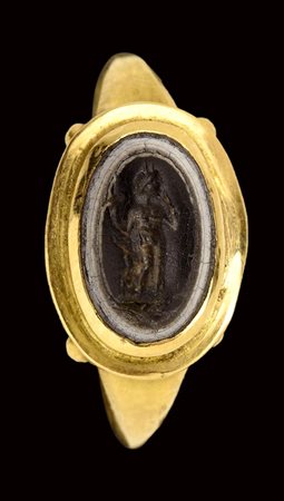A roman three-layers agate intaglio mounted in a modern gold ring. Harpocrates. 