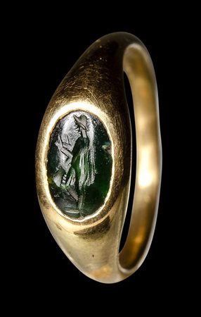 A roman green chalcedony intaglio set in a postclassical gold ring. Bonus Eventus. 