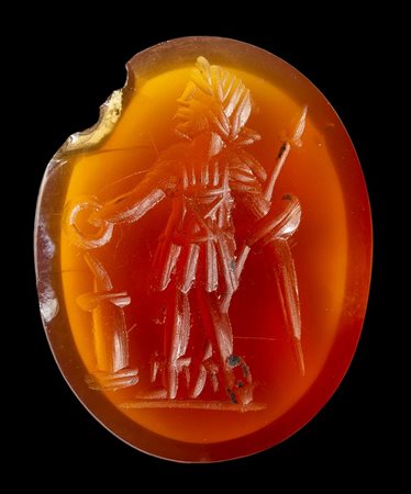 A roman carnelian intaglio. Military votive scene. 