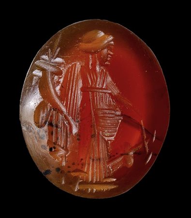 A roman carnelian intaglio with dark inclusions. Fortuna-Tyche.