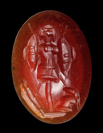 A roman carnelian intaglio. Trophy. 