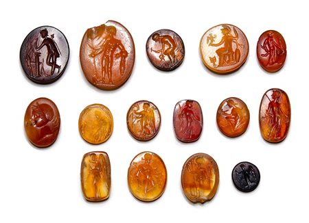A group of 15 roman carnelian intaglios. Varia.