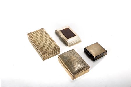 Lotto di quattro scatole in argento e legno, prima metà del secolo XX