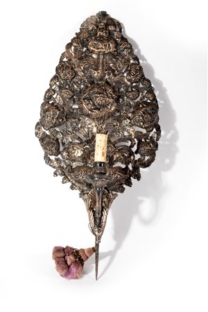 Antica applique in metallo argentato