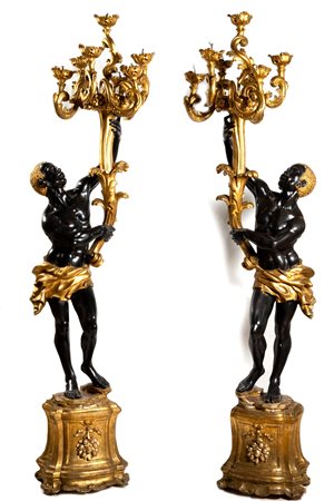Coppia di mori reggi candelabri, in legno laccato e dorato, fine secolo XIX