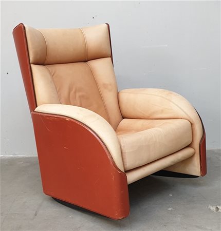 Rossi di Albizzate Poltrona a dondolo. Italia, anni '80. Scocca in cuoio, rivest