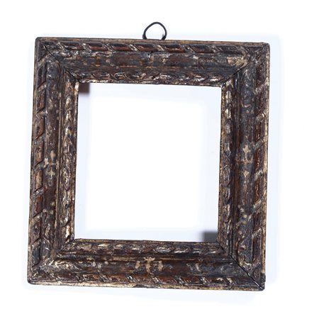 Cornice intagliata e argentata. XVIII secolo