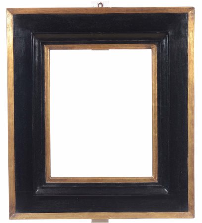 Grande cornice di ampia fascia in legno ebanizzato con profili dorati, XIX secolo