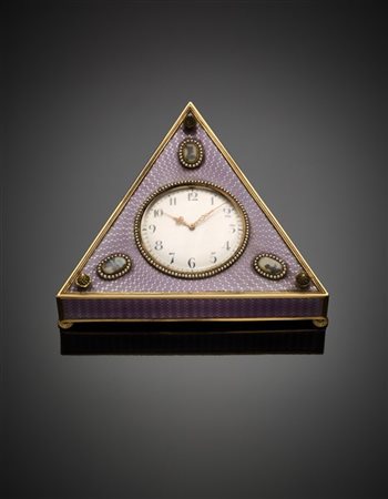 FABERGE'
"A jewelled, gold-mounted silver-gilt and enamel table timepiece, Fabe