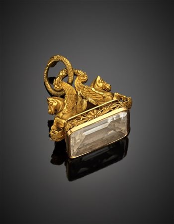 Sigillo pendente in oro giallo con mostri marini metà cavalli alati e metà delf