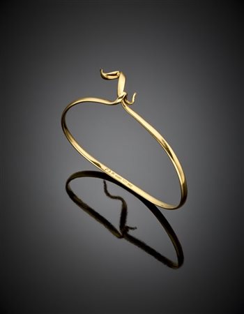 GEORG JENSEN - TORUN
Bracciale rigido a nastro in oro giallo, g 13,30 circa, di