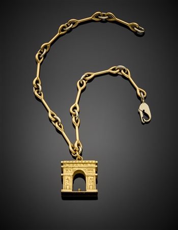 CARTIER
Bracciale a catena modulare in oro giallo e bianco con pendente a guisa