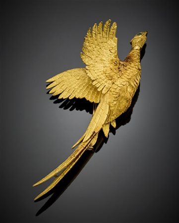 HERMES 
Spilla in oro giallo a guisa di fagiano in volo, g 27,72 circa, lungh.