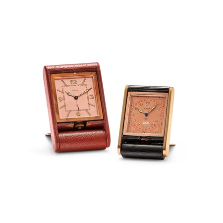 Jaeger-LeCoultre - two travel clocks with alarm and calendar, ‘50s