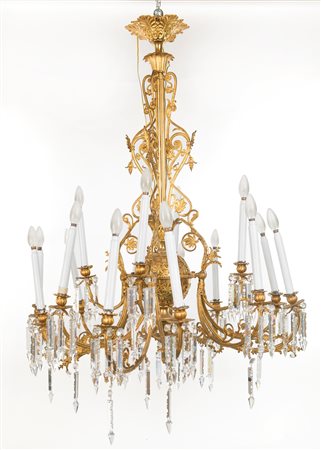  
Lampadario in bronzo dorato a sedici luci, XIX secolo 
 cm 120x95 ca.