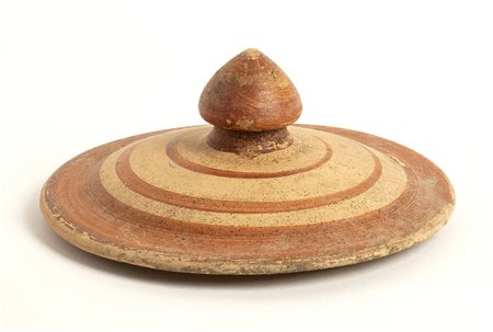 COPERCHIO DI URNA ITALO-GEOMETRICAVII - VI secolo a.C.diam. cm...