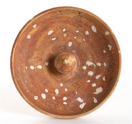 PATERACanosa (?), III secolo a.C.diam. cm 17; alt. cm 3Intatta, con due fori...