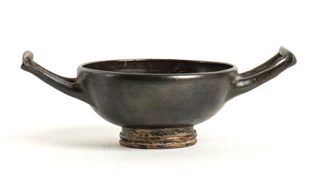 KYLIX A VERNICE NERAApulia, IV - III secolo a.C.diam. vasca cm 10Con stampo...