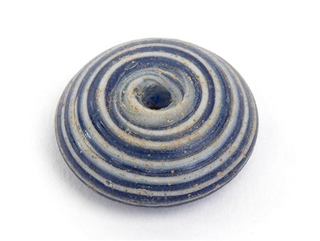 FUSAIOLA IN PASTA VITREAMediterraneo Orientale, epoca ellenisticadiam. cm...