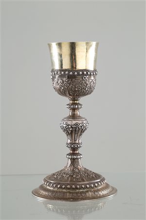 Silver finely chiseled chalice, gr. 446 ca.