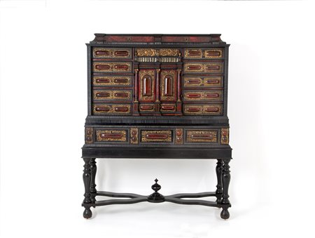 Wooden cabinet with bronze details. North Europe