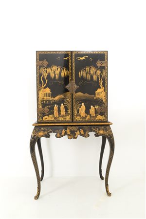 Black lacquered wood cabinet with gold decorations