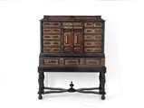 Wooden cabinet with bronze details. North Europe