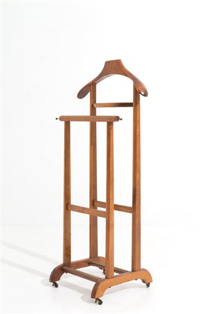 Wooden valet stand with brass knobs. '50s