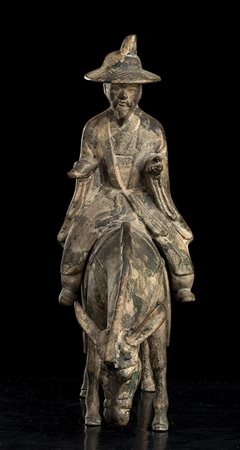 LETTERATO SU ASINO IN METALLO 
Cina, XX secolo