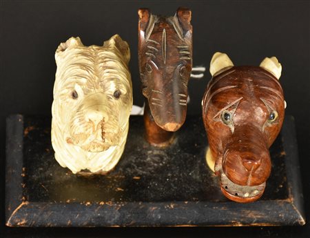IMPUGNATURE PER BASTONI DA PASSEGGIO raffiguranti dei canidi in legno e...