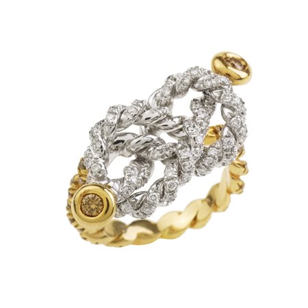 ANELLO IN ORO GIALLO, BIANCO E DIAMANTI in oro bicolorore 18kt, la parte...