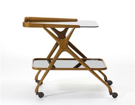 Carrello in legno massello con due ripiani in vetro fumè. Italia, anni '50. (cm