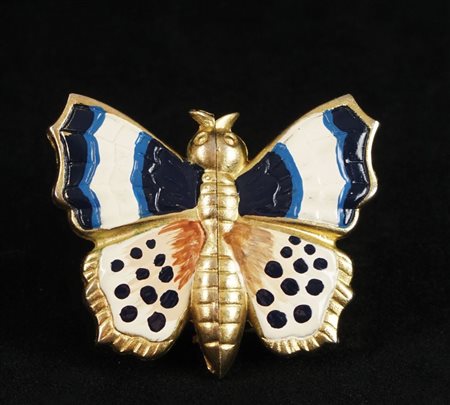 Orologio da signora con cassa in metallo dorato e smalti in forma di una...