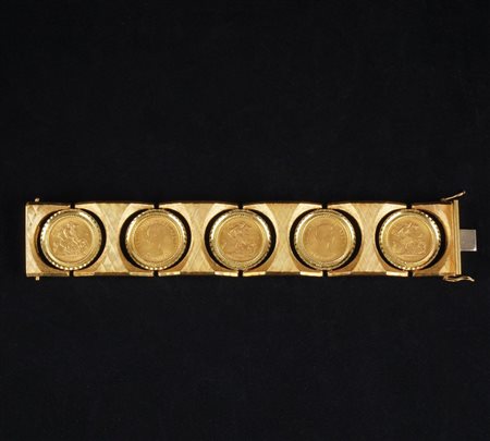 Bracciale oro giallo 18kt. decorato da 5 sterline inglesi parimenti in oro...