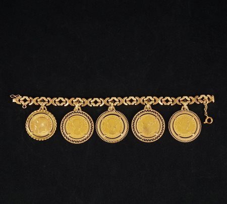 Bracciale in oro giallo 18kt. con 5 sterline inglesi pendenti parimenti in...
