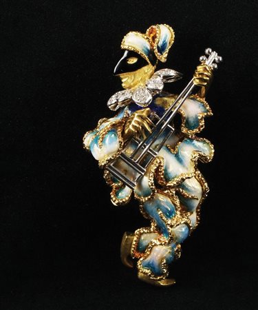 Elegante spilla in oro giallo e bianco 18kt. rivestito di smalto bianco e...