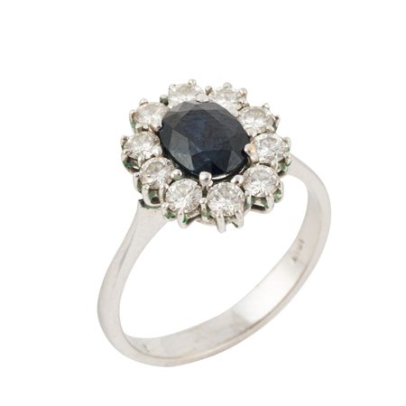 ANELLO in oro bianco 18 KT con brillanti e zaffiro centrale