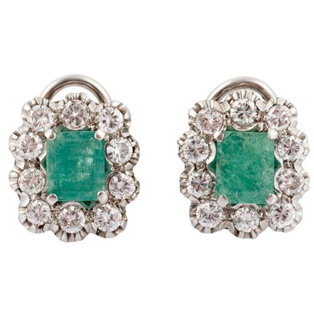 ORECCHINI in oro bianco 18 KT con brillanti e smeraldi