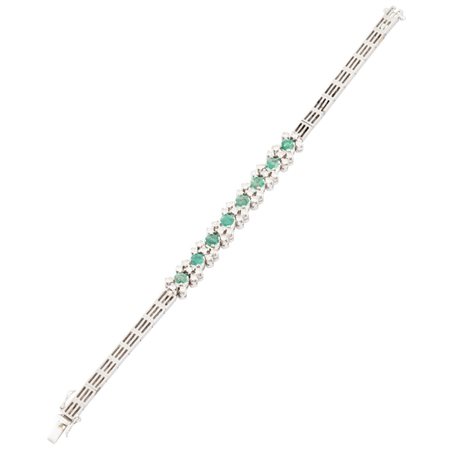 BRACCIALE in oro bianco 18 KT con diamanti e smeraldi
