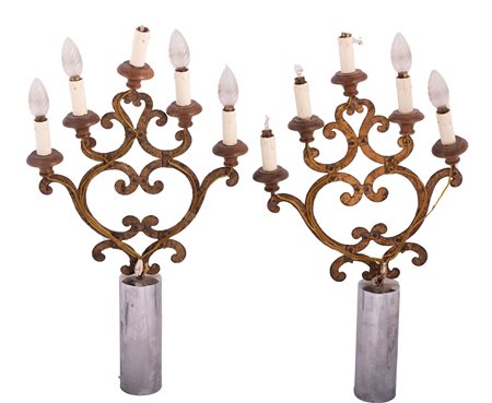 Manifattura romana del XVIII secolo ( - ) 
Coppia di candelabri a 5 fiamme 
Ferro battuto altezza cm 55
