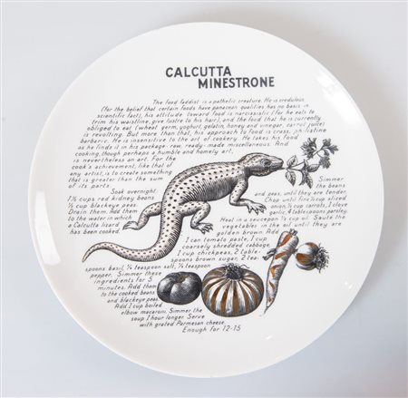 PIERO FORNASETTI Un piatto in ceramica con inserti in oro 14kt della serie...