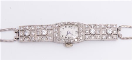 OROLOGIO PER SIGNORA. In platino, cassa tonneau in due corpi, anteriormente...